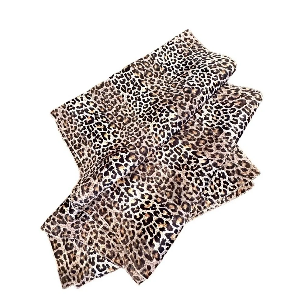 ANIMAL PRINT, NWOT, WOMENS SCARF. THIN, LIGHTWEIGHT, POLYESTER WITH A SILK FEEL.